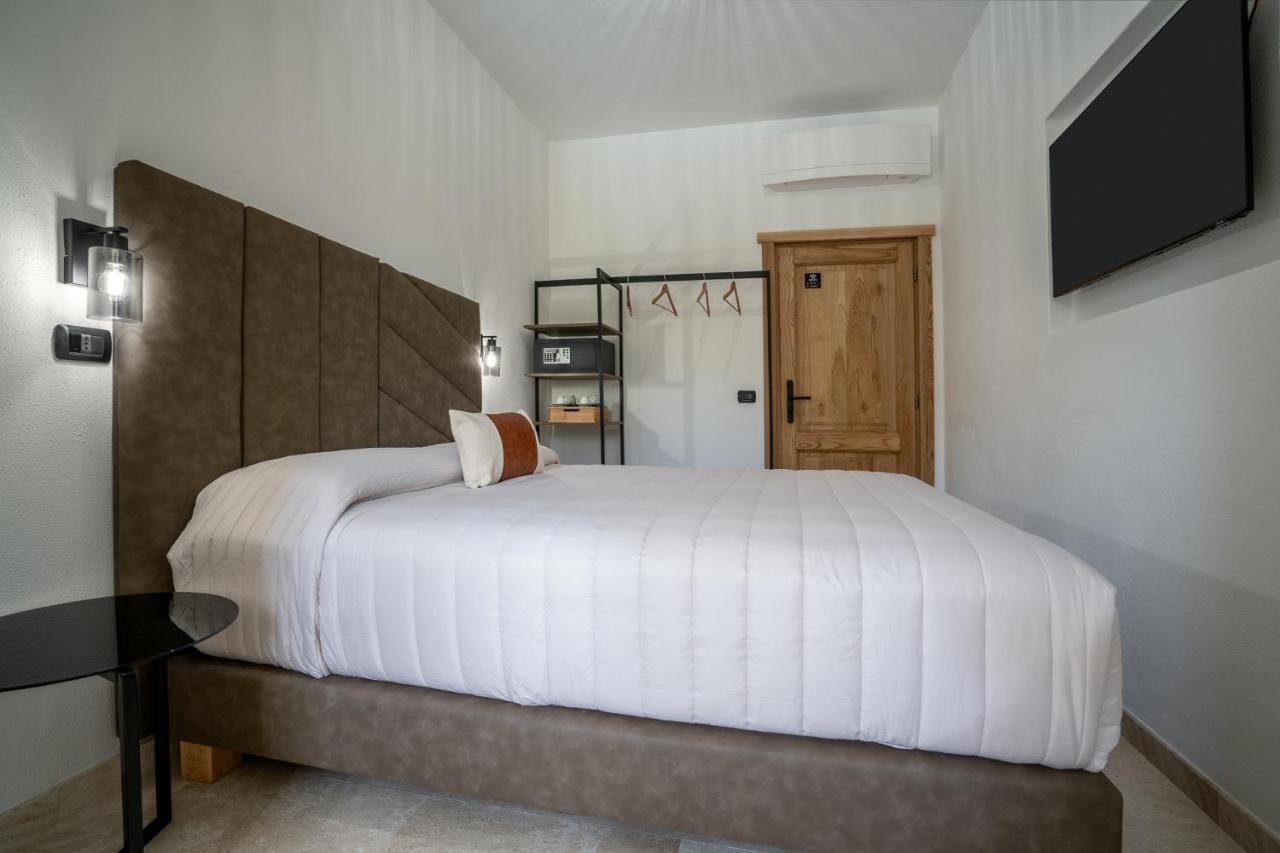 Paghe Eco Luxury Experience Hotel Budduso Bagian luar foto